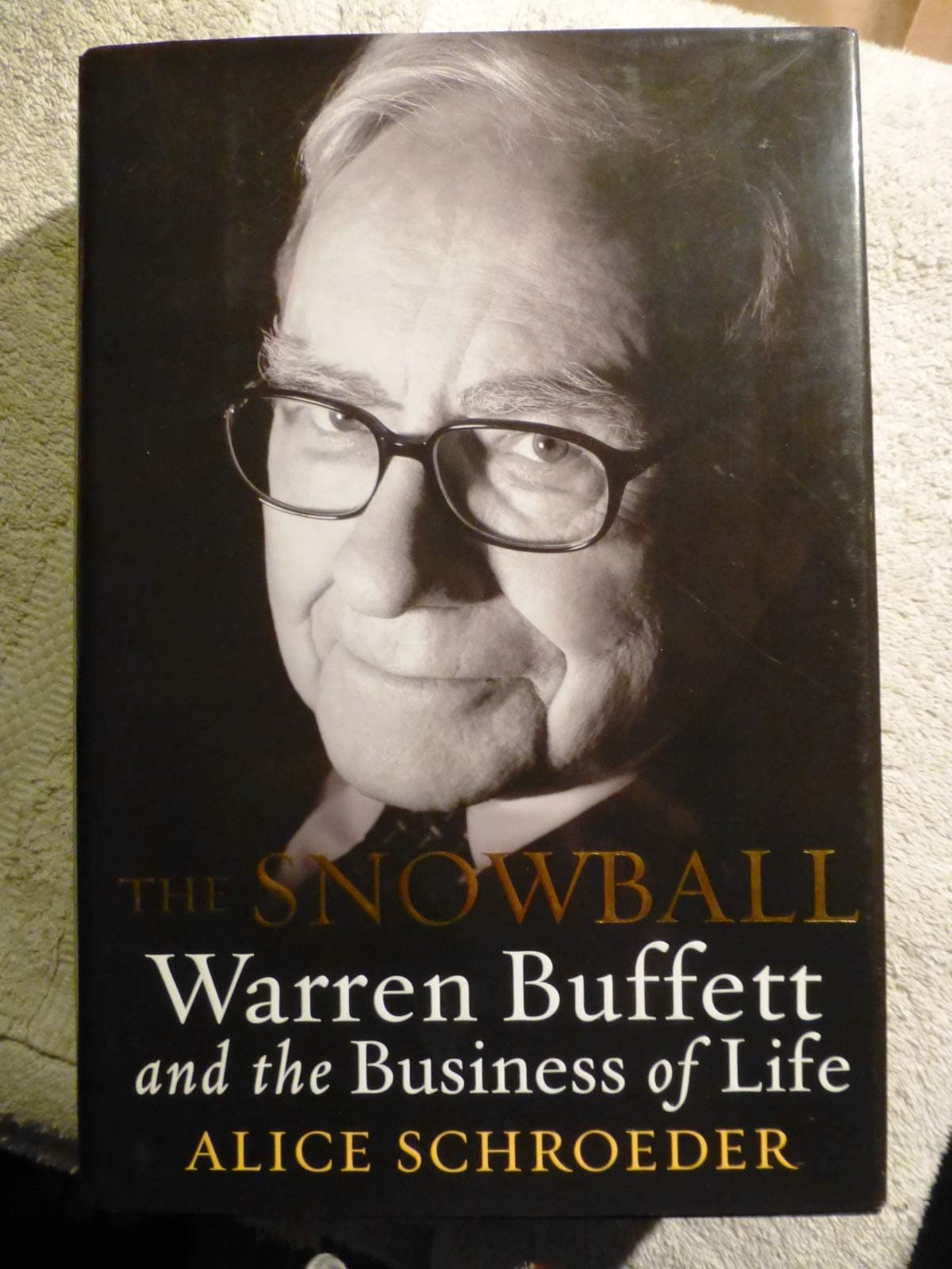 Snowball Warren Buffett and the Business of Life by Alice Schroeder First Edition Hardcover – January 1, 2011