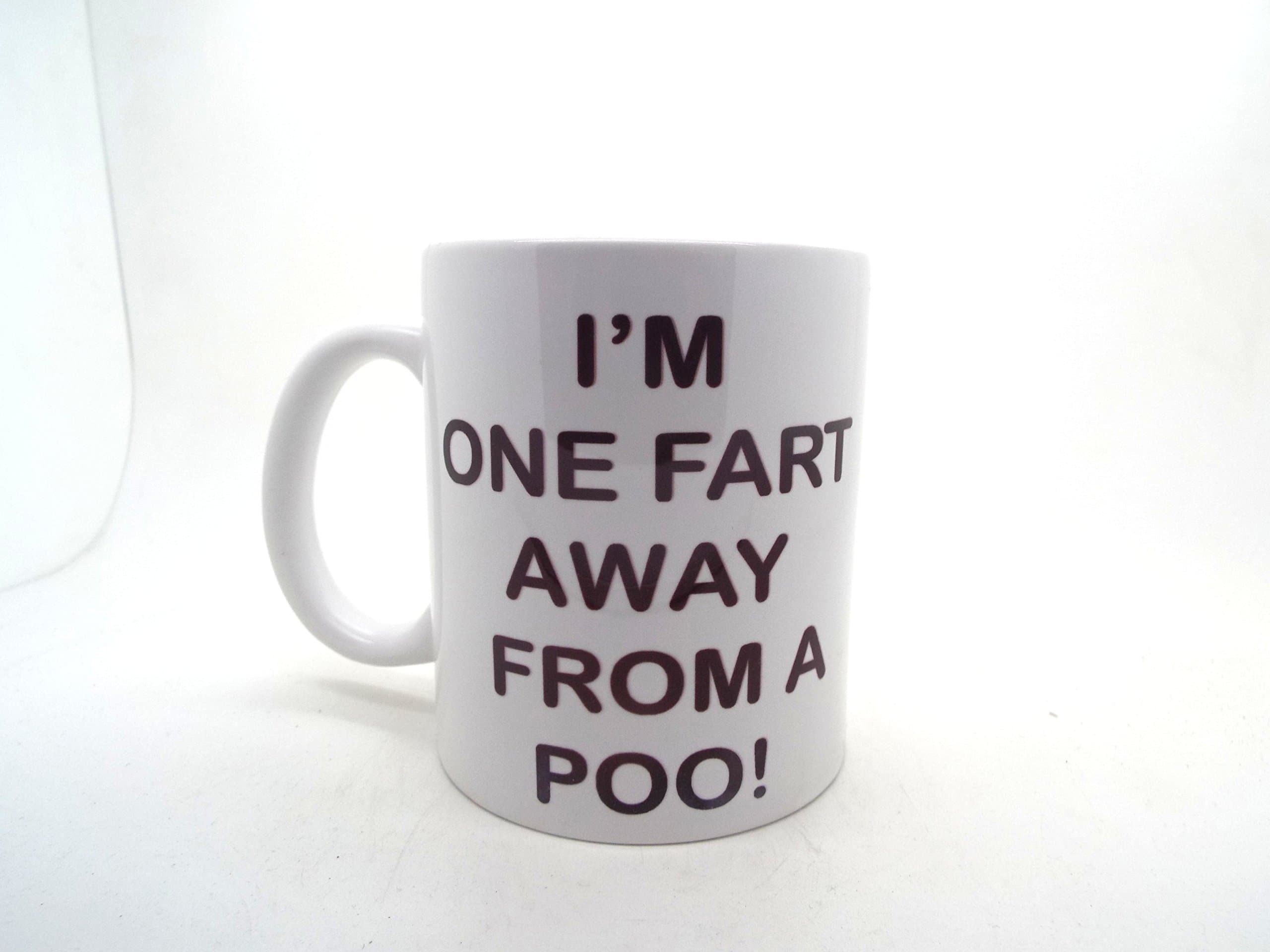 I'M ONE FART AWAY FROM A POO BLACK WRITING Mug