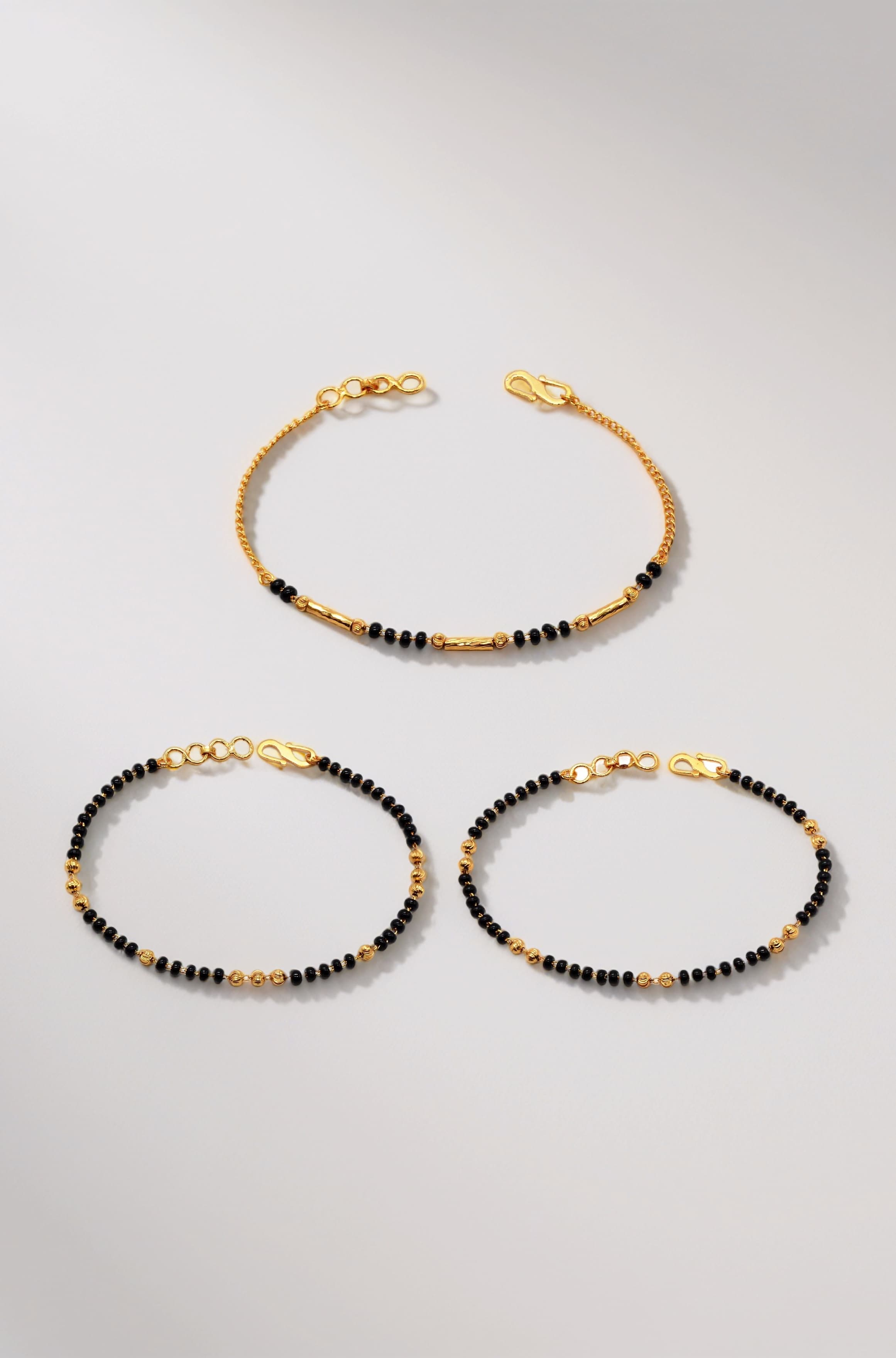 JHB Golden Gold-Plated Brass Bracelet 3 pis Combo for Women (Black Bead Hand Mangalsutra Bracelet)