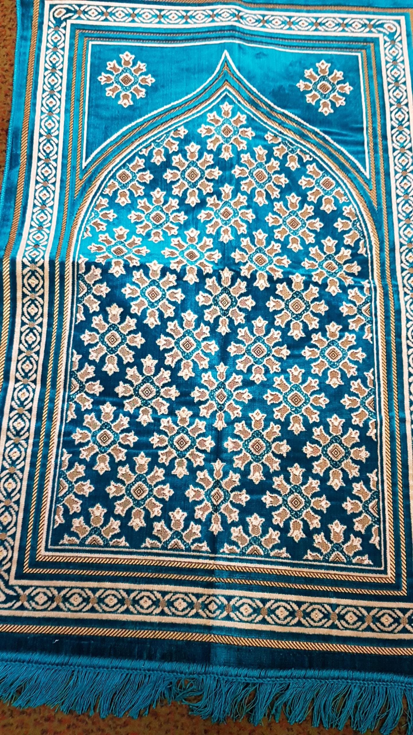 Mihrab prayer mat slightly padded in seagreen/blue with cream pattern (more green than the picture).