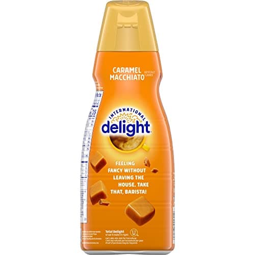 International-Delight Liquid Coffee Creamer.- Two (2) 32 fl oz Bottles of Creamy Smooth Delightful Coffee Creamer and One Authentic CureCor Collective Sticker! (Caramel Macchiato)