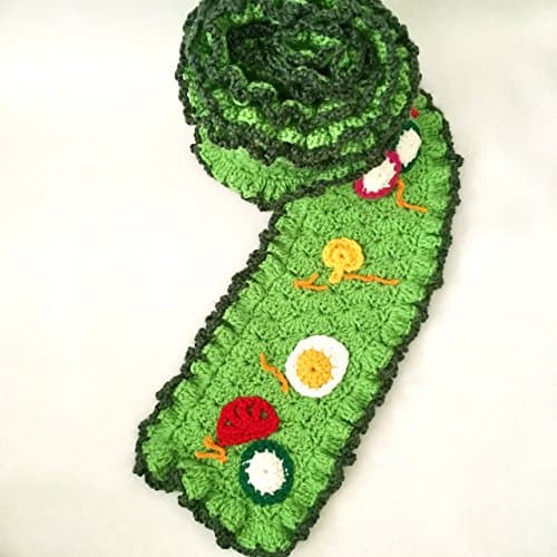 crochet salad scarf with red tomatoes, orange carrots, green lettuce, yellow mushrooms, pink radishes, green cucumbers, and white and yellow egg yolks