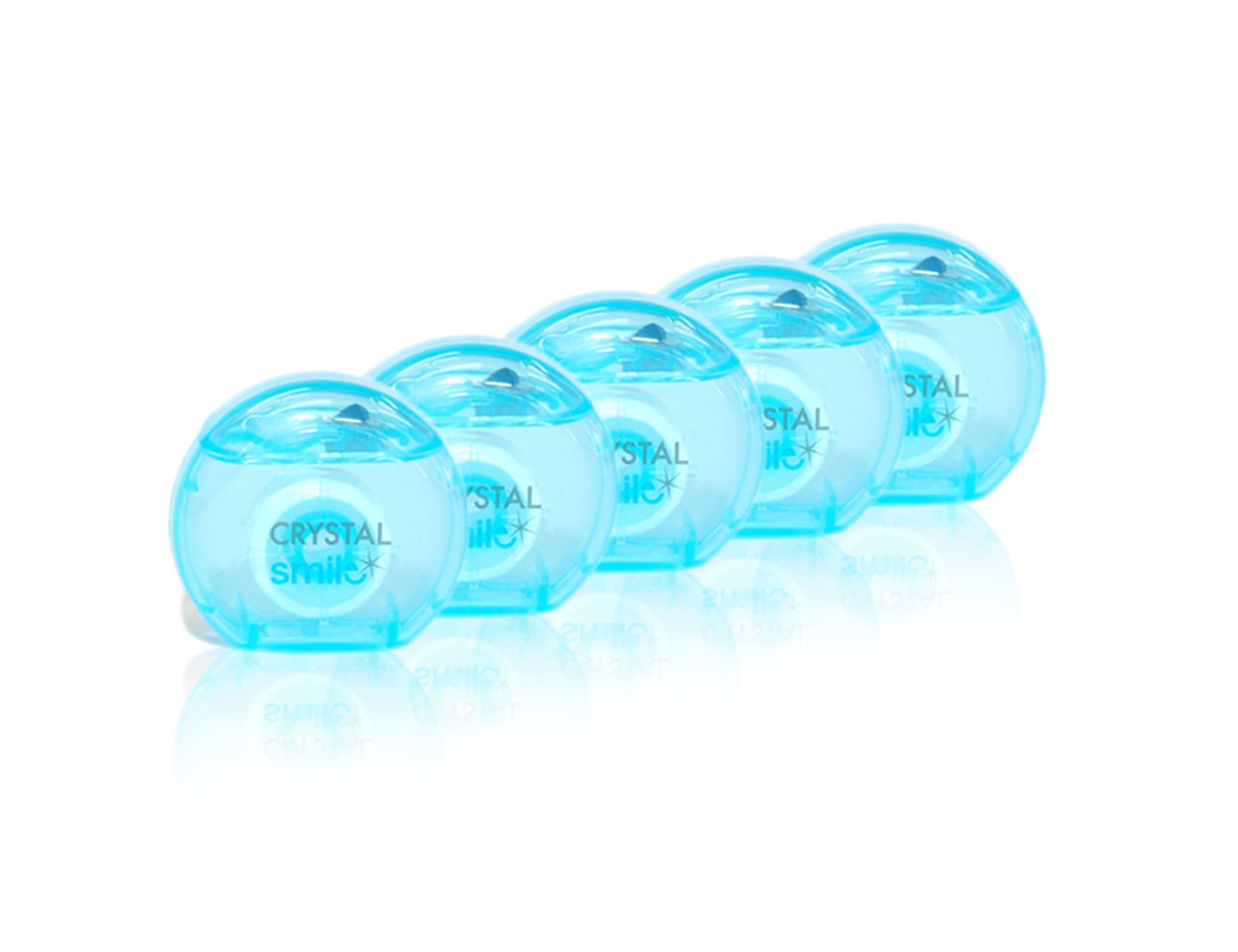 5 PACK Crystal Smile High Performance MICRO GLIDE TAPE (FLOSS) coated with HIGH QUALITY WAX and MINT FLAVOURED for an effortless flossing action to REMOVE PLAQUE and resulting in HEALTHIER GUMS. STRONG AND SHRED RESISTANT. GENTLE ON GUMS