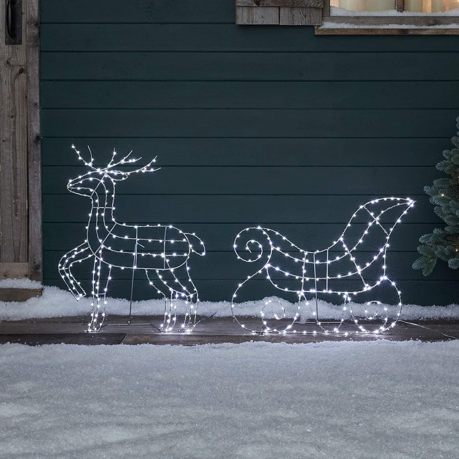 Lights4fun Outdoor Reindeer and Sleigh Silhouette Garden Decoration 360 White LEDs Plug In Timer 60cm