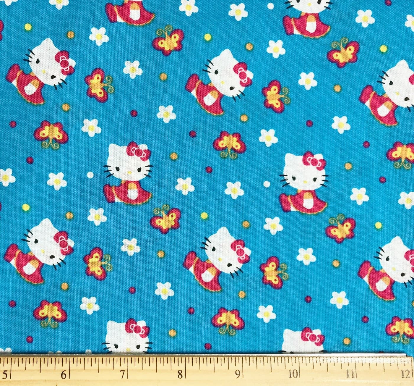 Hello Kitty Cotton or Flannel Fabric - Officially Licensed (Great for Quilting, Sewing, Craft Projects, Throw Pillows & More) (Hello Kitty Butterflies, 1 Yard X 44" Wide)